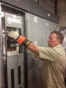 Denver Commercial Electrician testing damaged lighting contactor